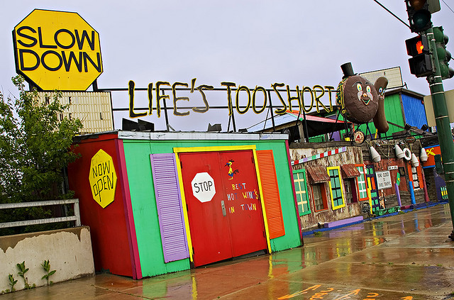 Colorful beach storefront called "Life's Too Short"